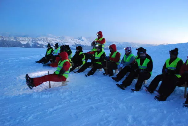Tobogganing by night in Le Semnoz
